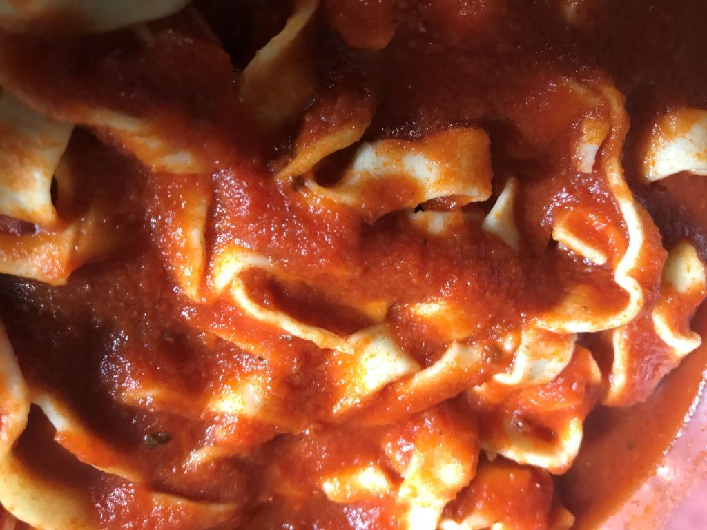 Homemade linguini with fresh tomato marinara sauce