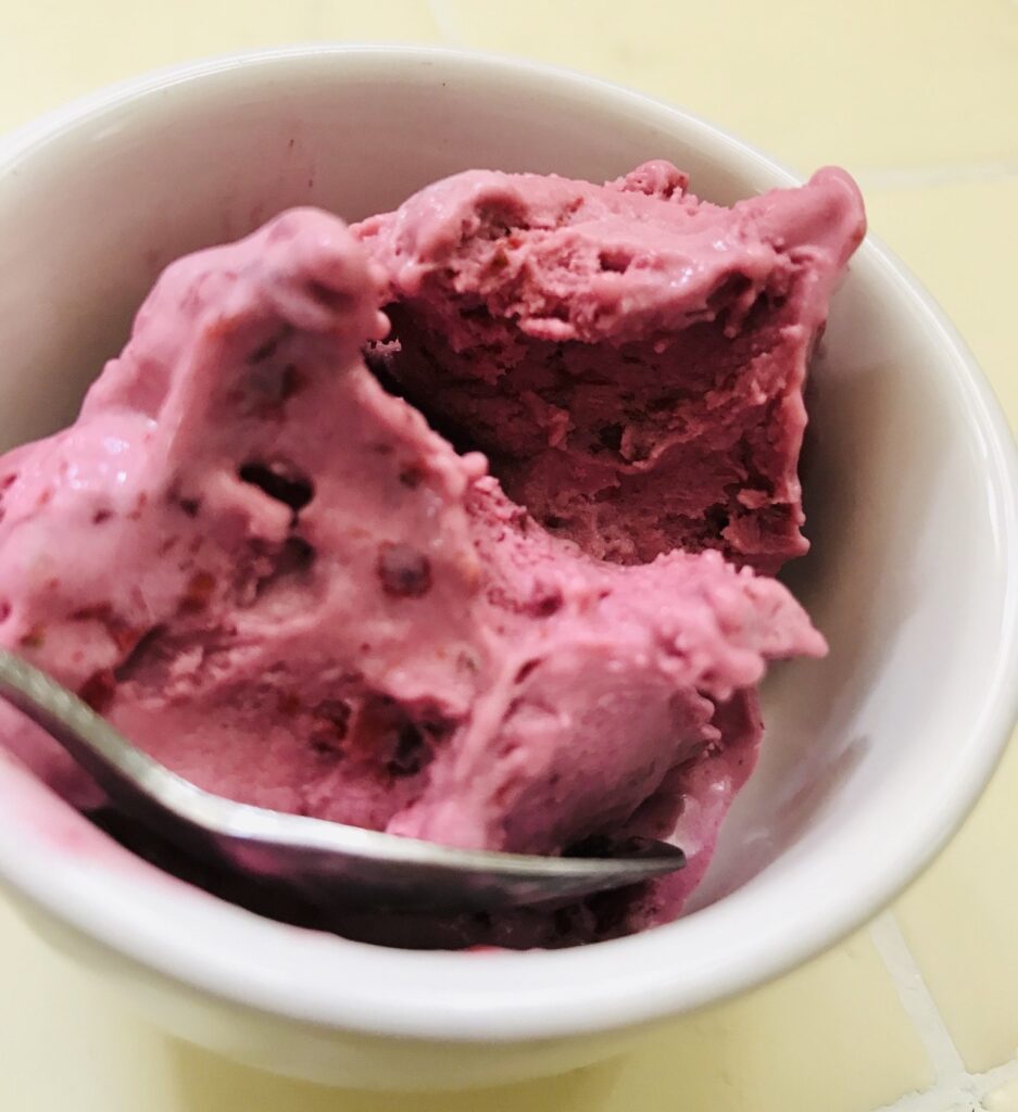 Homemade ice cream with strawberries and raspberries